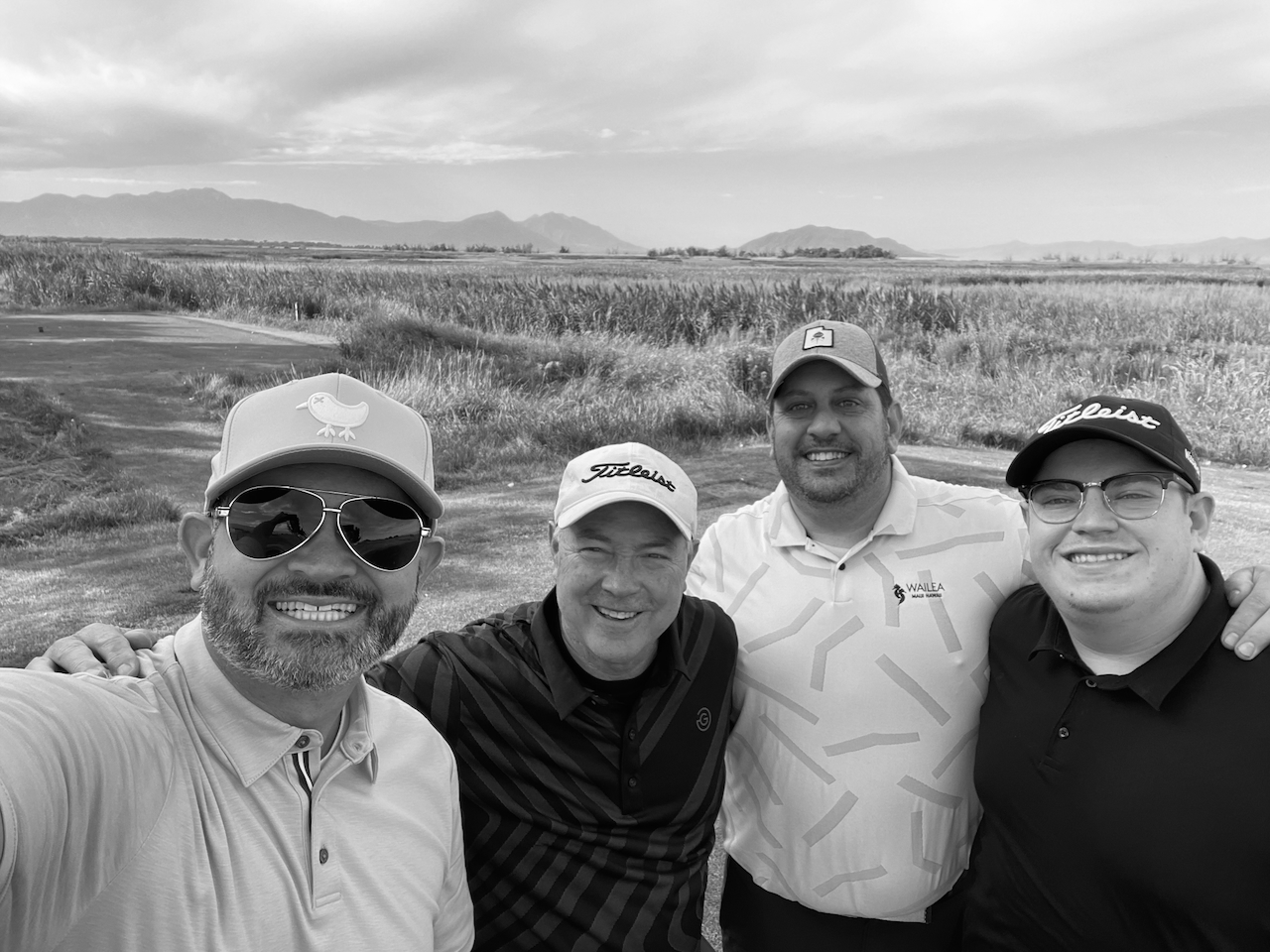 Devin golfing with friends