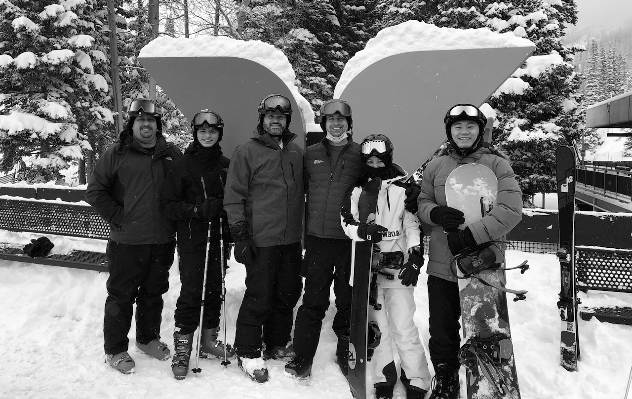 Devin skiing with team